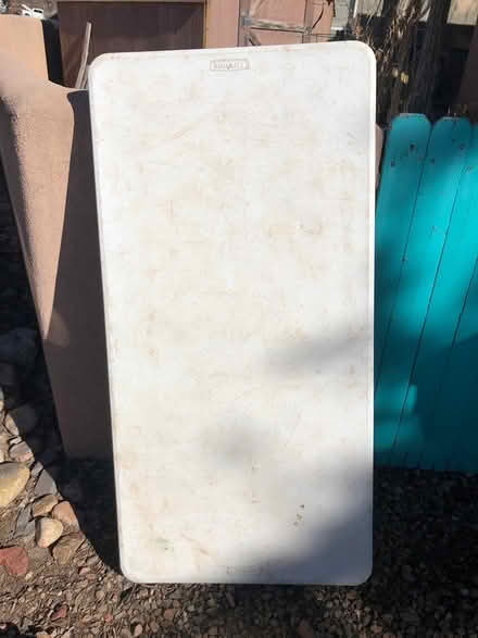Photo of free plastic table (Cerrillos & St. Francis) #1