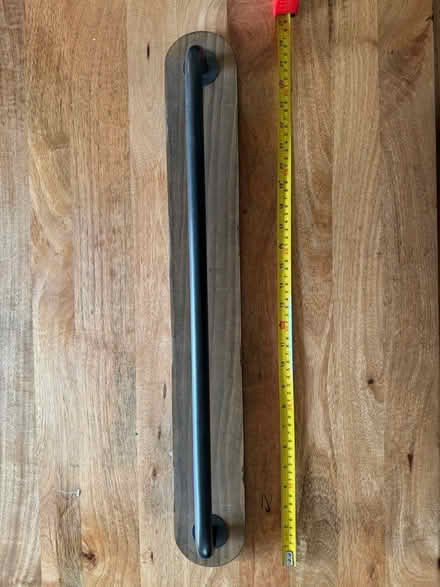 Photo of free Wall rack (Uptown Oakland) #1