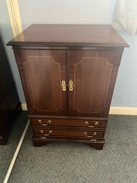 Photo of free Tv cabinet (Harwood) #1