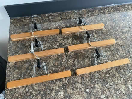 Photo of free 6 wooden trouser hangers (Slough SL3) #1