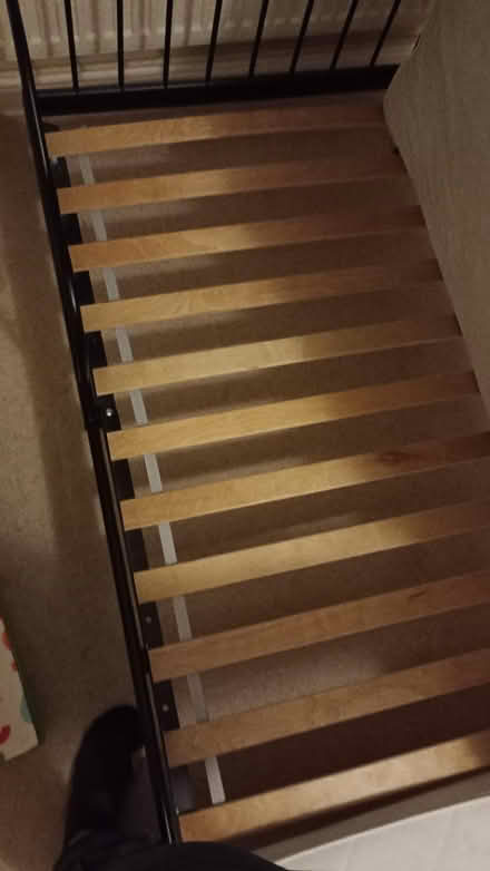 Photo of free IKEA child's bed - black metal frame extendable (Lower Sheering CM21) #3