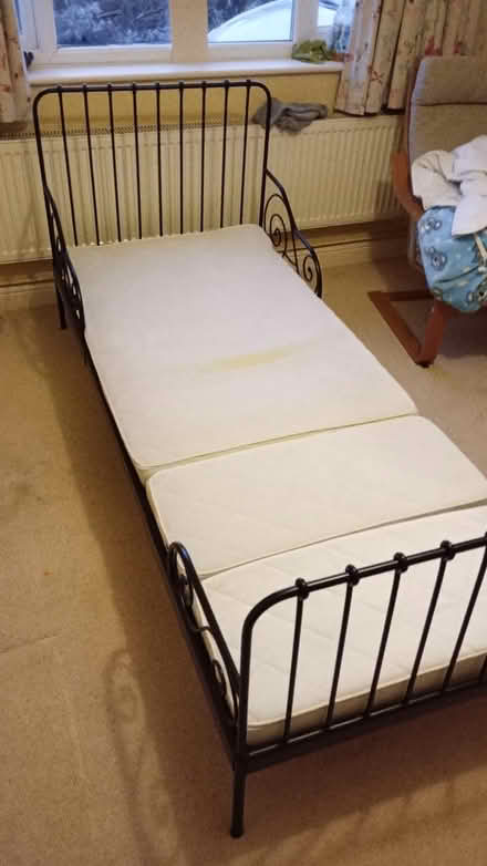 Photo of free IKEA child's bed - black metal frame extendable (Lower Sheering CM21) #1