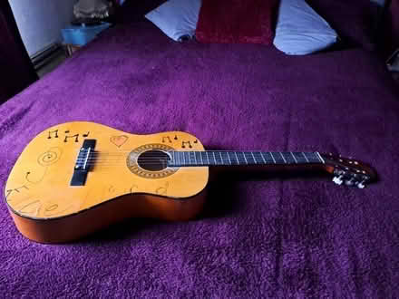 Photo of free Small guitar (Southport PR9) #1