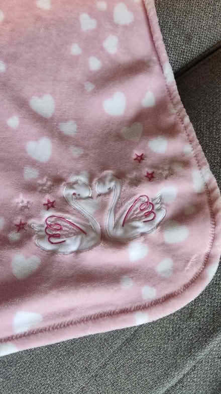 Photo of free Pink and white fleece baby blanket with swan applique (Stirchley B29) #1