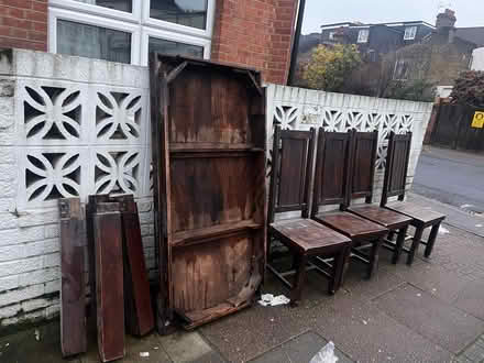 Photo of free Four wood chairs and dining table (SW11) #1
