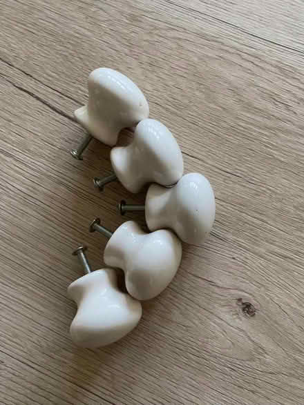 Photo of free 5 ceramic door or drawer knobs (Street BA16) #1