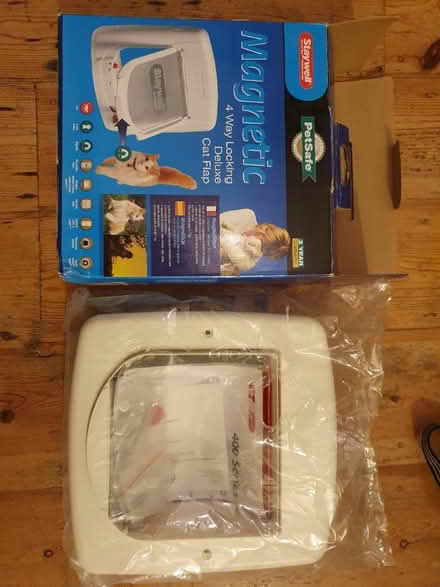 Photo of free White magnetic cat flap (SW8 Oval Vauxhall) #1