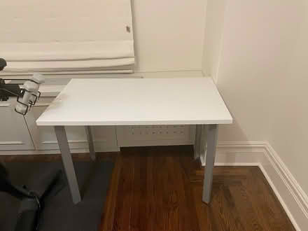 Photo of free White Desk with metal legs (East Village) #1