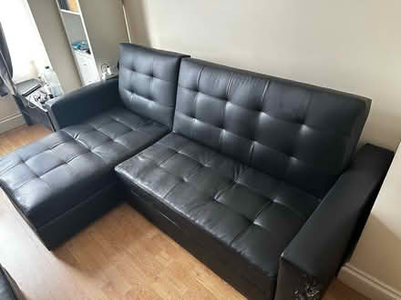 Photo of free Black L-shaped leather? couch (East Finchley N2) #1