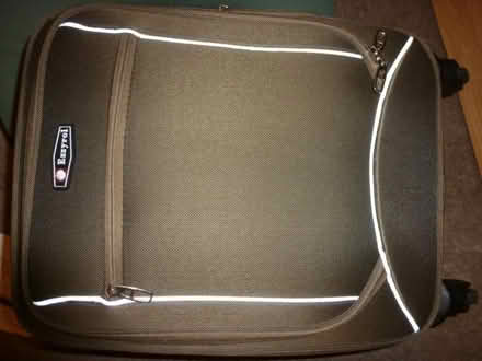 Photo of free SUITCASE ON WHEELS - fOR PARTS - 1 WHEEL FAULTY (Stepney E1) #1
