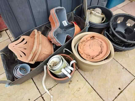 Photo of free Assorted garden pots, baskets, etc (GU12) #1