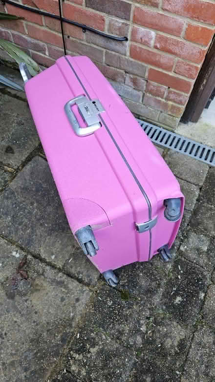 Photo of free Pink hard shell suitcase (PO19) #2