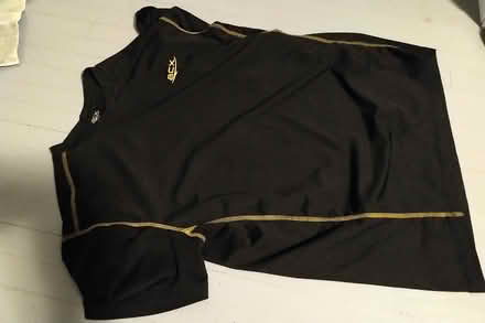 Photo of free Size medium black athletic shirt (Weber/Wellington) #1