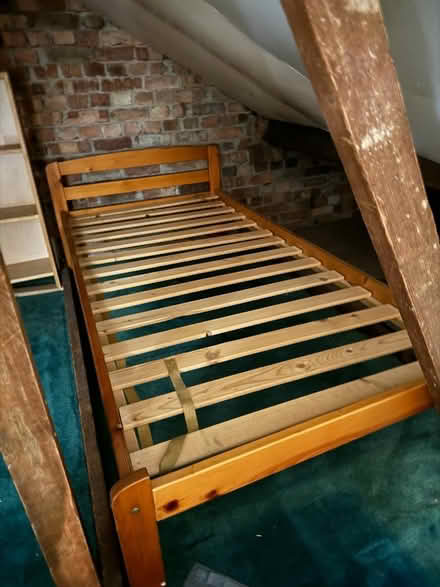 Photo of free Single wooden bed frame (AL7) #1