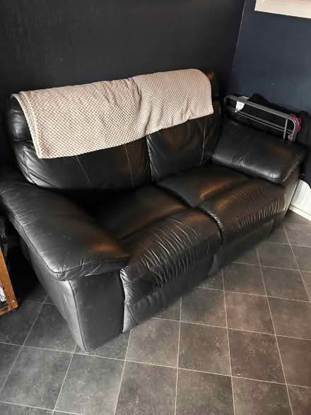 Photo of free Black Leather Sofa (Old Colwyn LL29) #1