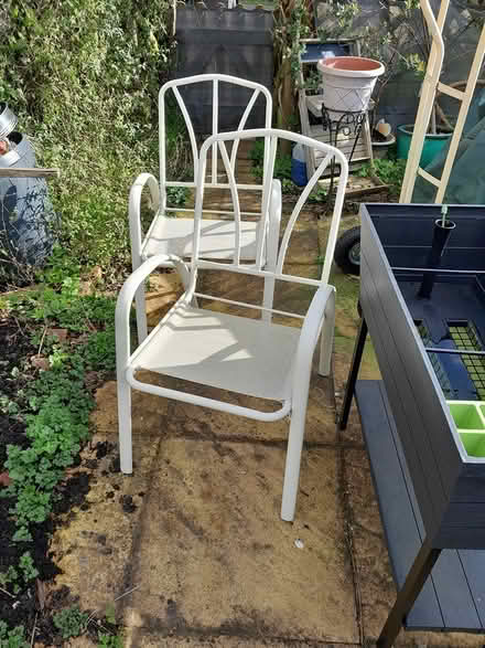 Photo of free 2 white garden chairs (Bridgnorth High Town WV16) #1