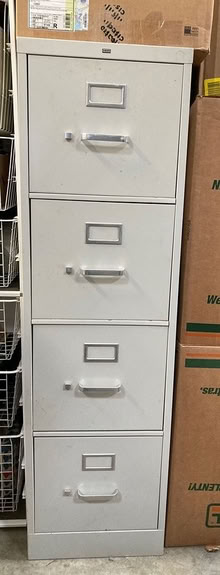 Photo of free 4 drawer file cabinet (Olivette) #1