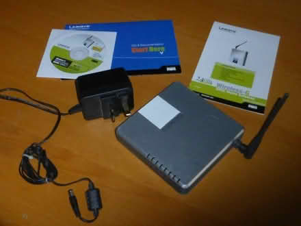 Photo of free Linksys wireless router/switch (Datchet SL3) #3