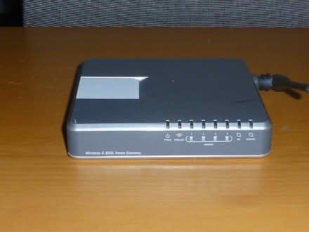 Photo of free Linksys wireless router/switch (Datchet SL3) #2