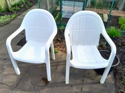 Photo of free Pair of plastic garden chairs (Blackness TN6) #1