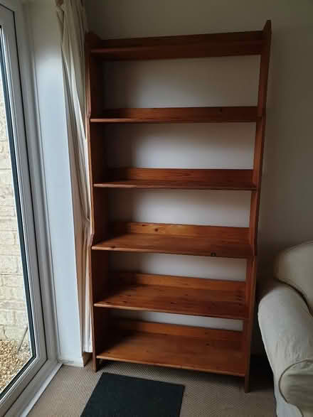 Photo of free IKEA tall pine bookshelf (Bussage GL6) #1