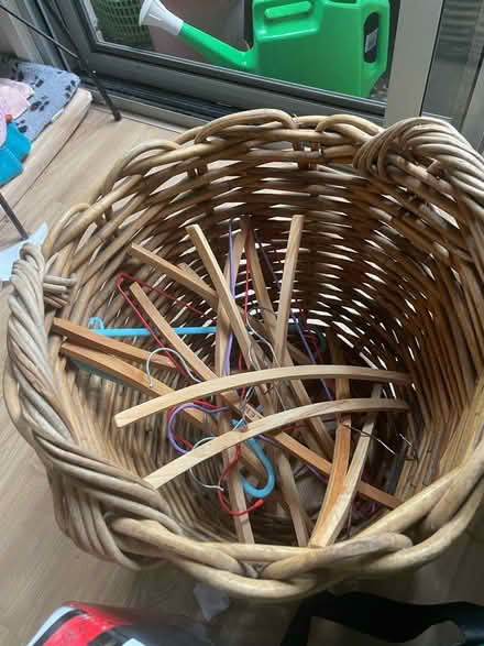 Photo of free Cane basket with coat hangers (Fitzgibbon) #1