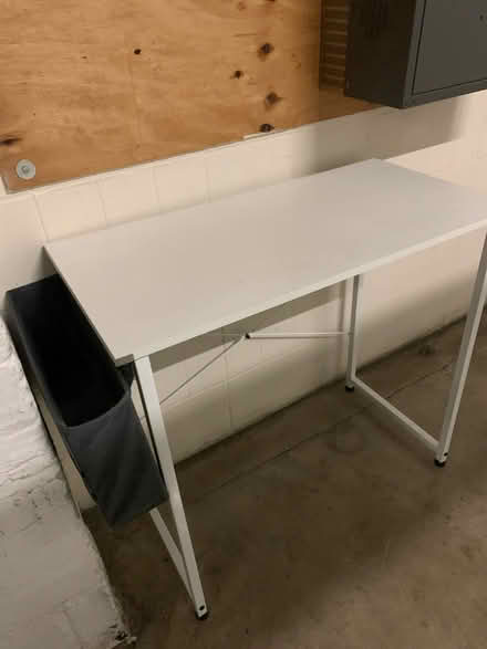 Photo of free Small white desk * earliest pickup (16 Street & First Ave Manhatta) #2