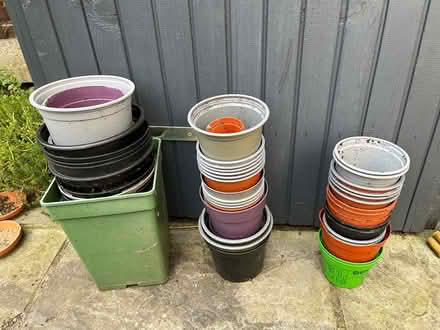 Photo of free Assorted plastic plant pots (Colliers Wood SW19) #1