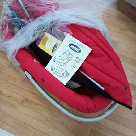 Photo of free Red baby carrier with hood (Charlbury OX7) #1