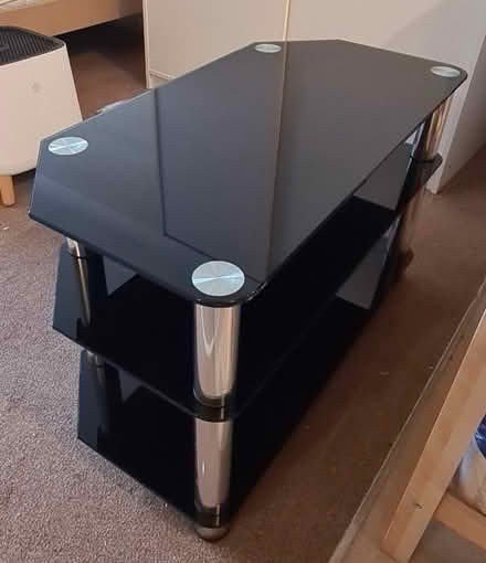 Photo of free Black glass TV stand (Teignmouth TQ14) #1