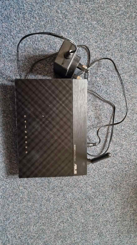 Photo of free Asus wireless router rt-10e (BS4) #1