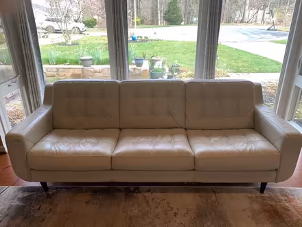 Photo of free Warm white leather couch (Bowie) #2