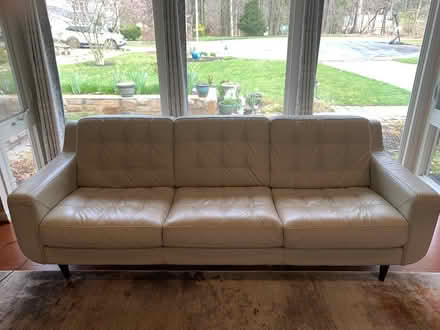 Photo of free Warm white leather couch (Bowie) #2