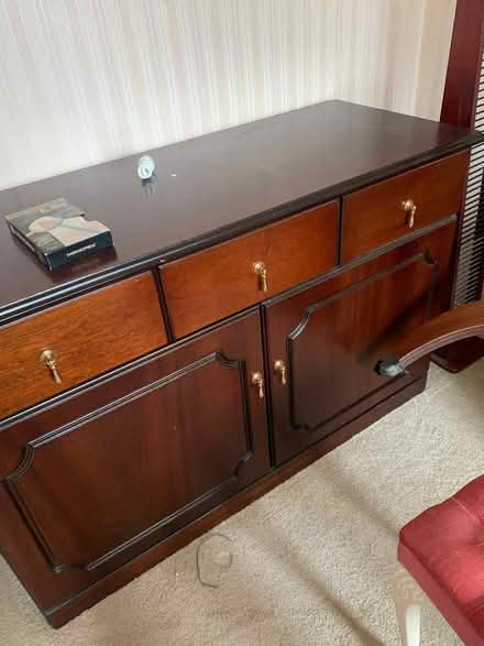 Photo of free Dark wood side board. (Southport PR8) #1