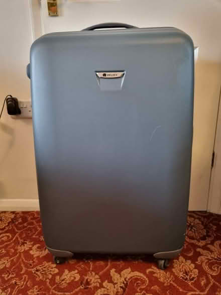 Photo of free Large Delsey Suitcase (Grays RM17) #1