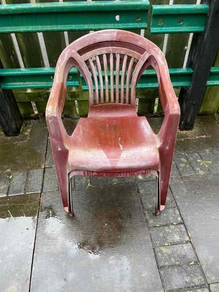 Photo of free 2 maroon plastic garden chairs (West Malvern CP WR14) #1