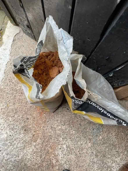 Photo of free Bags of red sand (open but dry) (Hale L24) #1