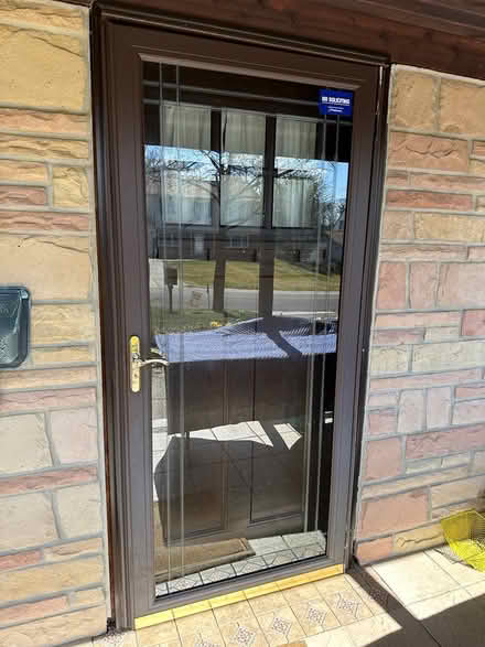 Photo of free Old storm door (Bowie, MD) #1