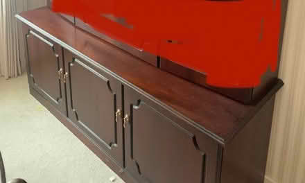Photo of free Dark wood sideboard. (Southport PR8) #1