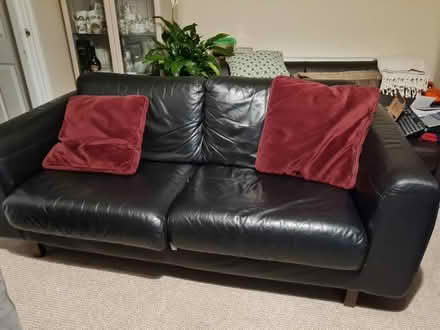 Photo of free Black leather sofa w cushions (Leytonstone E11) #1