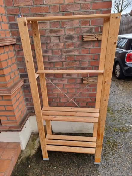 Photo of free Tall wood shelving (NW2) #1