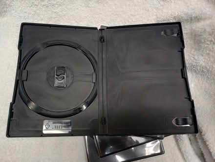 Photo of free Four larger CD cases (Suffern - Jersey Ave) #2