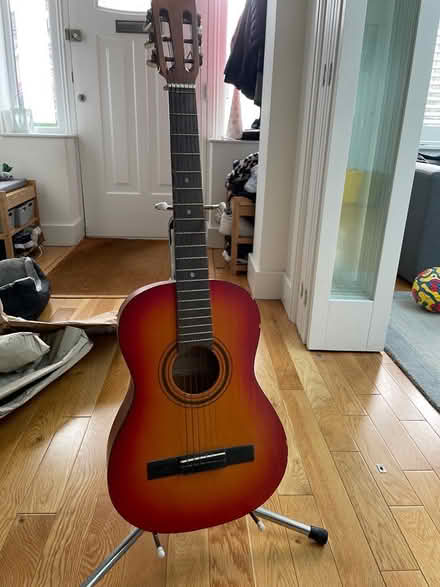 Photo of free Guitar with stand (Harrow HA2) #1