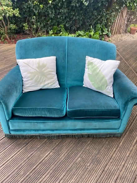 Photo of free 2 seater teal coloured sofa (Merton park) #1