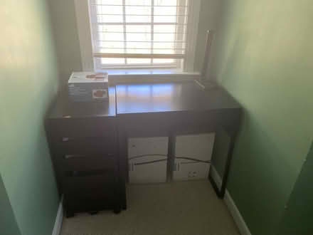 Photo of free small black wood desk (23060) #1