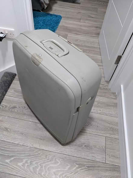 Photo of free Large suitcase (one handle broken) (Camden Town NW1) #1