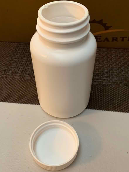 Photo of free Opaque white supplement containers (Carlingwood/Lincoln Fields) #1