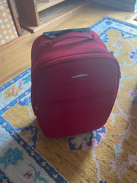 Photo of free Old used red suitcase (Berwick Grange SY1) #1