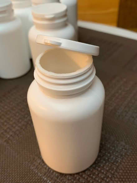 Photo of free Opaque white supplement containers (Carlingwood/Lincoln Fields) #2