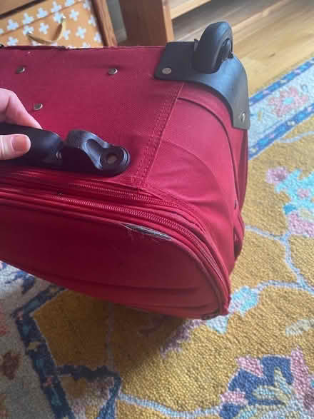 Photo of free Old used red suitcase (Berwick Grange SY1) #2
